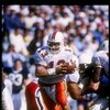 10 Oct 1992:  Quarterback Gino Torretta of the Miami Hurricanes drops back during a game against the Penn State Nittany Lions at Beaver Stadium in University Park, Pennsylvania.  Miami won the game 17-14. Mandatory Credit: Gene Sweeney  /Allsport