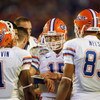 MIAMI - JANUARY 08:  Quarterback Tim Tebow #15 of the Florida Gators huddles against the Oklahoma Sooners during the FedEx BCS National Championship Game at Dolphin Stadium on January 8, 2009 in Miami, Florida.  (Photo by Eliot J. Schechter/Getty Images