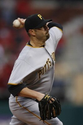 ST. LOUIS, MISSOURI - APRIL 6: Relief pitcher John Grabow #34 of the Pittsburgh Pirates throws against the St. Louis Cardinals during Opening Day on April 6, 2009 at Busch Stadium in St. Louis, Missouri.  The Pirates beat the Cardinals 6-4.  (Dilip Vishwa