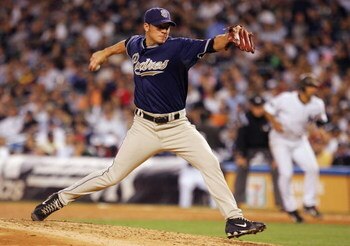 NEW YORK - JUNE 18: Jake Peavy #44 of the San Diego Padres pitches against the New York Yankees at Yankee Stadium June 18, 2008 in the Bronx borough of New York City. The Yankees defeated the Padres 8-5. (Photo by Jim McIsaac/Getty Images) 