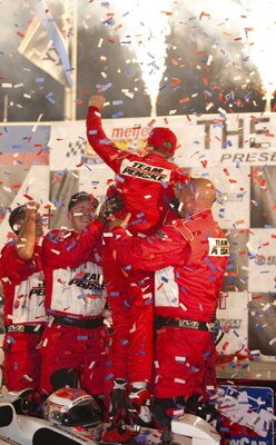 SPARTA, KY - AUGUST 01:  Ryan Briscoe driver of the #6 Team Penske Dallara Honda celebrates with his teamates after winning the IRL IndyCar Series Meijer Indy 300 on August 1, 2009 at the Kentucky Speedway in Sparta, Kentucky.  (Photo by Robert Laberge/Ge