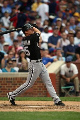CHICAGO - JUNE 18:  Gordon Beckham #15 of the Chicago White Sox bats against the Chicago Cubs during the game on June 18, 2009 at Wrigley Field in Chicago, Illinois. (Photo by Jonathan Daniel/Getty Images)