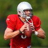 ALLEN PARK, MI - AUGUST 04: Matthew Stafford #9 of the Detroit Lions gets ready to throw a pass during training camp at the Detroit Lions Headquarters and Training Facility on August 4, 2009 in Allen Park, Michigan.  (Photo by Gregory Shamus/Getty Images)
