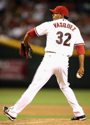 PHOENIX - MAY 08:  Relief pitcher Esmerling Vasquez #32 of the Arizona Diamondbacks pitches against the Washington Nationals during the game at Chase Field on May 8, 2009 in Phoenix, Arizona.  The Nationals defeated the Diamondbacks 5-4.  (Photo by Christ