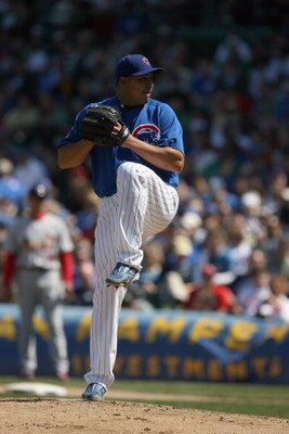 CHICAGO - APRIL 17:  Carlos Zambrano #38 of the Chicago Cubs pitches against the St. Louis Cardinals on April 17, 2009 at Wrigley Field in Chicago, Illinois. (Photo by Jonathan Daniel/Getty Images) 