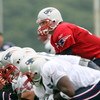 FOXBORO, MA - JULY 31:  Quarterback Tom Brady #12 of the New England Patriots lines up during training camp on July 31, 2009 at Gillette Stadium in Foxboro, Massachusetts.  (Photo by Elsa/Getty Images)