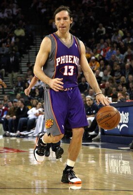 OAKLAND, CA - MARCH 15:  Steve Nash #13 of the Phoenix Suns dribbles the ball against the Golden State Warriors during an NBA game on March 15, 2009 at Oracle Arena in Oakland, California. NOTE TO USER: User expressly acknowledges and agrees that, by down
