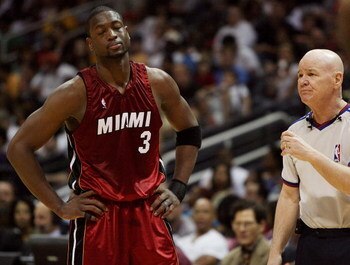 ATLANTA - MAY 03:  Dwyane Wade #3 of the Miami Heat reacts after talking with official Joe Crawford while taking on the Atlanta Hawks during Game Seven of the Eastern Conference Quarterfinals at Philips Arena on May 3, 2009 in Atlanta, Georgia. The Hawks 