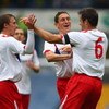 SHEFFIELD, ENGLAND - AUGUST 01:  Ryan Nelsen of Blackburn Rovers celebrates with Stephen Warnock (l) and Keith Andrews (c) after scoring the opening goal during a Pre Season Friendly match between Sheffield Wednesday and Blackburn Rovers at the Hillsborou