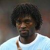 BARNSLEY, UNITED KINGDOM - AUGUST 01:  Emmanuel Adebayor of Manchester City looks on during the Pre Season Friendly match between Barnsley and Manchester City at the Oakwell Stadium on August 1, 2009 in Barnsley, England.  (Photo by Matthew Lewis/Getty Im