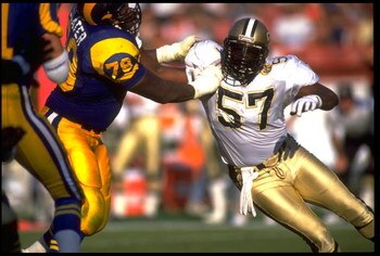 3 NOV 1991:  NEW ORLEANS SAINTS LINEBACKER RICKEY JACKSON #57 TRIES TO AVOID THE BLOCK OF LOS ANGELES RAMS OFFENSIVE LINEMAN JACKIE SLATER #78 DURING THE SAINTS 24-17 WIN AT ANAHEIM STADIUM IN ANAHEIM, CALIFORNIA.
