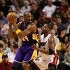 MIAMI - DECEMBER 19:  Dwyane Wade #3 of the Miami Heat guards Kobe Bryant #24 of the Los Angeles Lakers at American Airlines Arena on December 19, 2008 in Miami, Florida. The Heat defeated the Lakers 89-87. NOTE TO USER: User expressly acknowledges and ag