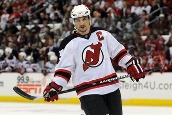 RALEIGH, NC - APRIL 26: Jamie Langenbrunner #15 of the the New Jersey Devils skates as he waits for a face-off in the first period of Game Six of the Eastern Conference Quarterfinals of the 2009 Stanley Cup Playoffs against the Carolina Hurricanes on Apri