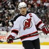 RALEIGH, NC - APRIL 26: Jamie Langenbrunner #15 of the the New Jersey Devils skates as he waits for a face-off in the first period of Game Six of the Eastern Conference Quarterfinals of the 2009 Stanley Cup Playoffs against the Carolina Hurricanes on Apri