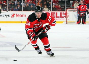 NEWARK, NJ - JANUARY 30:  Brian Gionta #14 of the New Jersey Devils skates against the Pittsburgh Penguins at the Prudential Center on January 30, 2009 in Newark, New Jersey. The Devils defeated the Penguins 4-3 in overtime.  (Photo by Jim McIsaac/Getty I