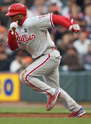 SAN FRANCISCO - AUGUST 01:  Jimmy Rollins #11 of the Philadelphia Phillies steals second base against the San Francisco Giants in the first innning during a Major League Baseball game at AT&T Park on August 1, 2009 in San Francisco, California.  (Photo by