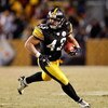 PITTSBURGH - JANUARY 18:  Troy Polamalu #43 of the Pittsburgh Steelers returns an interception 40 yards for a touchdown against the Baltimore Ravens during the fourth quarter of the AFC championship game on January 18, 2009 at Heinz Field in Pittsburgh, P