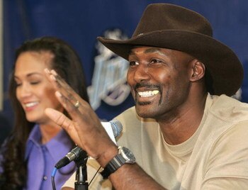 SALT LAKE CITY - FEBRUARY 13:  Karl Malone gestures as he announces his retirement from playing NBA basketball on February 13, 2005 at the Delta Center in Salt Lake City, Utah. Malone played 19 years in the NBA, 18 with the Utah Jazz and his last year wit