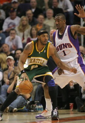 PHOENIX - FEBRUARY 8:  Chris Wilcox #54 of the Seattle SuperSonics posts against Amare' Stoudemire #1 of the Phoenix Suns on February 8, 2008 at US Airways Center in Phoenix, Arizona. NOTE TO USER: User expressly acknowledges and agrees that, by downloadi