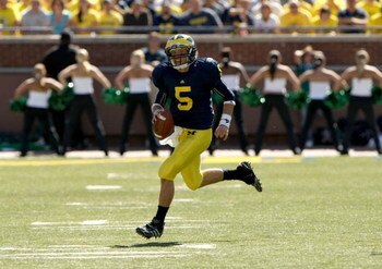 ANN ARBOR, MI - SEPTEMBER 19:  Quarterback Tate Forcier #5 of the Michigan Wolverines carries the ball against the Eastern Michigan Eagles at Michigan Stadium on September 19, 2009 in Ann Arbor, Michigan.   Michigan won 45-17.  (Photo by Stephen Dunn/Gett
