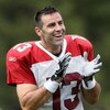 FLAGSTAFF, AZ - JULY 31: Quarterback Kurt Warner #13 of the Arizona Cardinals laughs during the evening team training camp at Northern Arizona University on July 31, 2009 in Flagstaff, Arizona. (Photo by Christian Petersen/Getty Images)