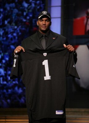 NEW YORK - APRIL 28:  JaMarcus Russell poses with his Oakland Raiders jersey after being chosen first overall by the Oakland Raiders at the 2007 NFL Draft at Radio City Music Hall April 28, 2007 in New York City.  (Photo by Nick Laham/Getty Images)
