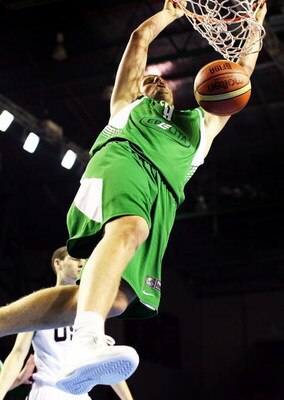 AUCKLAND, NEW ZEALAND - JULY 08:  Tautvydas Slezas of Lithuania dunks the ball during the U19 Basketball World Championships match between the United States and Lithuania at North Shore Events Centre on July 8, 2009 in Auckland, New Zealand.  (Photo by Ha