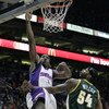 PHOENIX - FEBRUARY 8:  Amare' Stoudemire #1 of the Phoenix Suns lays the ball in against Chris Wilcox #54 of the Seattle SuperSonics on February 8, 2008 at US Airways Center in Phoenix, Arizona. NOTE TO USER: User expressly acknowledges and agrees that, b