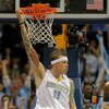 DENVER - MAY 23:  Chris Andersen #11 of the Denver Nuggets hangs on the rim after he dunks the ball in the first quarter against the Los Angeles Lakers in Game Three of the Western Conference Finals during the 2009 NBA Playoffs at Staples Center on May 23