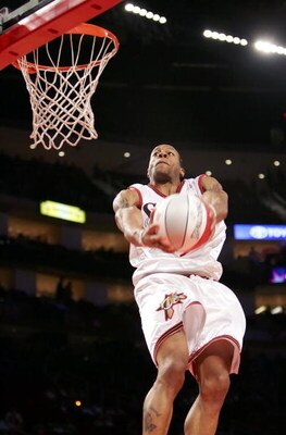 HOUSTON - FEBRUARY 17:  Andre Iguodala #9 of the Sophomore Team goes up to dunk the ball over his head during the second half of the T-Mobile Rookie Challenge during NBA All-Star Weekend at the Toyota Center on February 17, 2006 in Houston, Texas. NOTE TO