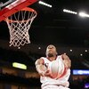 HOUSTON - FEBRUARY 17:  Andre Iguodala #9 of the Sophomore Team goes up to dunk the ball over his head during the second half of the T-Mobile Rookie Challenge during NBA All-Star Weekend at the Toyota Center on February 17, 2006 in Houston, Texas. NOTE TO