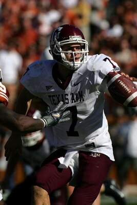 AUSTIN, TX - NOVEMBER 24:  Quarterback Stephen McGee #7 of the Texas A&M Aggies gets ready for a play against the Texas Longhorns at Darrell K Royal-Texas Memorial Stadium November 24, 2006 in Austin, Texas. The Aggies defeated the Longhorns 12-7.  (Photo