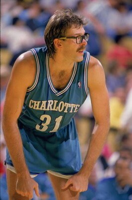 CHARLOTTE, NC - 1989:  Kurt Rambis #31 of the Charlotte Hornets rests during an NBA game at Charlotte Colesium in 1989. (Photo by Mike Powell/Getty Images)