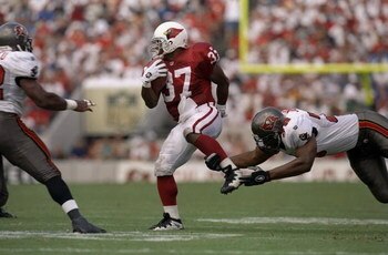 28 Sep 1997:  Larry Centers #37 of the Arizona Cardinals in action against Marcus Jones #78 of the Tampa Bay Buccaneers during a game at Houlihan Stadium in Tampa, Florda.  The Buccaneers defeated the Cardinals 19-18. Mandatory Credit: Andy Lyons  /Allspo