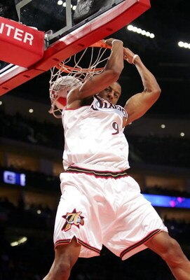 HOUSTON - FEBRUARY 17:  Andre Iguodala #9 of the Sophomore Team dunks the ball over his head during the second half of the T-Mobile Rookie Challenge during NBA All-Star Weekend at the Toyota Center on February 17, 2006 in Houston, Texas. NOTE TO USER: Use