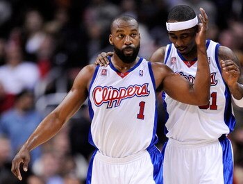 LOS ANGELES, CA - FEBRUARY 18:  Baron Davis #1 of the Los Angeles Clippers consoles Ricky Davis #31 during their , 142-119, loss to the Phoenix Suns at the Staples Center February 18, 2009, in Los Angeles, California. NOTE TO USER: User expressly acknowle