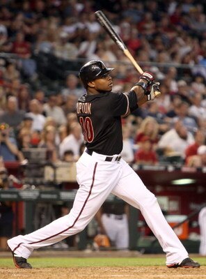 PHOENIX - JUNE 27:  Justin Upton #10 of the Arizona Diamondbacks bats against the Los Angeles Angels of Anaheim during the major league baseball game at Chase Field on June 27, 2009 in Phoenix, Arizona. The Angels defeated the Diamondbacks 2-1.  (Photo by