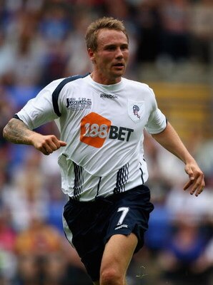 BOLTON, ENGLAND - AUGUST 08:  Matt Taylor of Bolton Wanderers in action during the Pre Season Friendly match between Bolton Wanderers and Hibernian at the Reebok Stadium on August 8, 2009 in Bolton, England.  (Photo by Clive Brunskill/Getty Images)