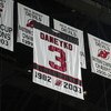 EAST RUTHERFORD, NJ - MARCH 24:  A banner rises to the rafters during a jersey retirement ceremony for Ken Daneyko #3 of the New Jersey Devils before the Devils game against the Boston Bruins on March 24, 2006 at the Continental Airlines Arena in East Rut
