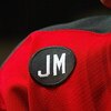 EAST RUTHERFORD, NJ - FEBRUARY 11:  A patch with the initials JM honors former New Jersey Devils owner John McMullen during their game against the New York Islanders on February 11, 2006 at the Continental Airlines Arena in East Rutherford, New Jersey. (P