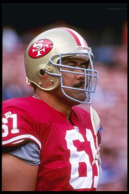 26 Aug 1994:  Offensive lineman Jesse Sapolu of the San Francisco 49ers looks on during a preseason game against the Seattle Seahawks at Candlestick Park in San Francisco, California.  The 49ers won the game, 13-9. Mandatory Credit: Otto Greule Jr.  /Alls