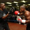 LONDON, ENGLAND - MAY 22:  Boxing superstar Floyd Mayweather in his first open workout since coming out of retirement with trainer and uncle Roger Mayweather, as he prepares for his fight against Juan Manuel Marquez of Mexico, at Peacock Gym on May 22, 20