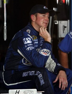 WATKINS GLEN, NY - AUGUST 08:  Kurt Busch, driver of the #2 Miller Lite Dodge, sits in the garage during practice for the NASCAR Sprint Cup Series Heluva Good! Sour Cream Dips at Watkins Glen International on August 8, 2009 in Watkins Glen, New York.  (Ph