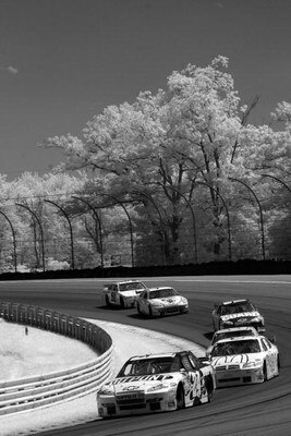 WATKINS GLEN, NY - AUGUST 10:   (EDITORS NOTE: AN INFRARED CAMERA WAS USED TO CREATE THIS IMAGE)  Jeff Gordon, driver of the #24 DuPont Chevrolet leads a pack of cars during the NASCAR Sprint Cup Series Heluva Good! Sour Cream Dips at Watkins Glen Interna