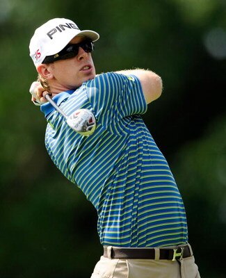 AKRON, OH - AUGUST 06:  Hunter Mahan hits a shot during the first round of the WGC-Bridgestone Invitational on the South Course at Firestone Country Club on August 6, 2009 in Akron, Ohio.  (Photo by Sam Greenwood/Getty Images)