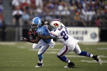 CANTON, OH - AUGUST 9: Chris Davis #17 of the Tennessee Titans tries to get around Terrence McGee #24 of the Buffalo Bills during the Pro Football Hall of Fame Game at Fawcett Stadium on August 9, 2009 in Canton, Ohio. The Titans defeated the Bills 21-18.