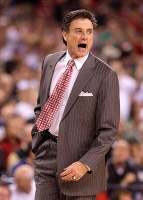 INDIANAPOLIS - MARCH 29:  Head coach Rick Pitino of the Louisville Cardinals coaches against the Michigan State Spartans during the fourth round of the NCAA Division I Men's Basketball Tournament at the Lucas Oil Stadium on March 29, 2009 in Indianapolis,