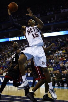 LONDON - OCTOBER 12:  Vince Carter (#15) of the  New Jersey Nets drives to the basket during the NBA preseason game as part of the 2008 NBA Europe Live Tour between New Jersey Nets and Miami Heat at the O2 Arena on October 12, 2008 in London, England.  NO