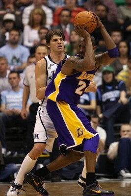 SALT LAKE CITY - APRIL 25:  Kobe Bryant #24 of the Los Angeles Lakers looks to pass under pressure from Kyle Korver #26 of the Utah Jazz in Game Four of the Western Conference Quarterfinals during the 2009 NBA Playoffs at Energy Solutions Arena on April 2