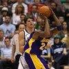 SALT LAKE CITY - APRIL 25:  Kobe Bryant #24 of the Los Angeles Lakers looks to pass under pressure from Kyle Korver #26 of the Utah Jazz in Game Four of the Western Conference Quarterfinals during the 2009 NBA Playoffs at Energy Solutions Arena on April 2